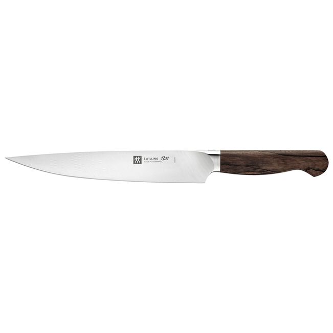 Chef knife (ツヴィリング 1731) with a long stainless-steel blade and a dark wooden handle on a white background.